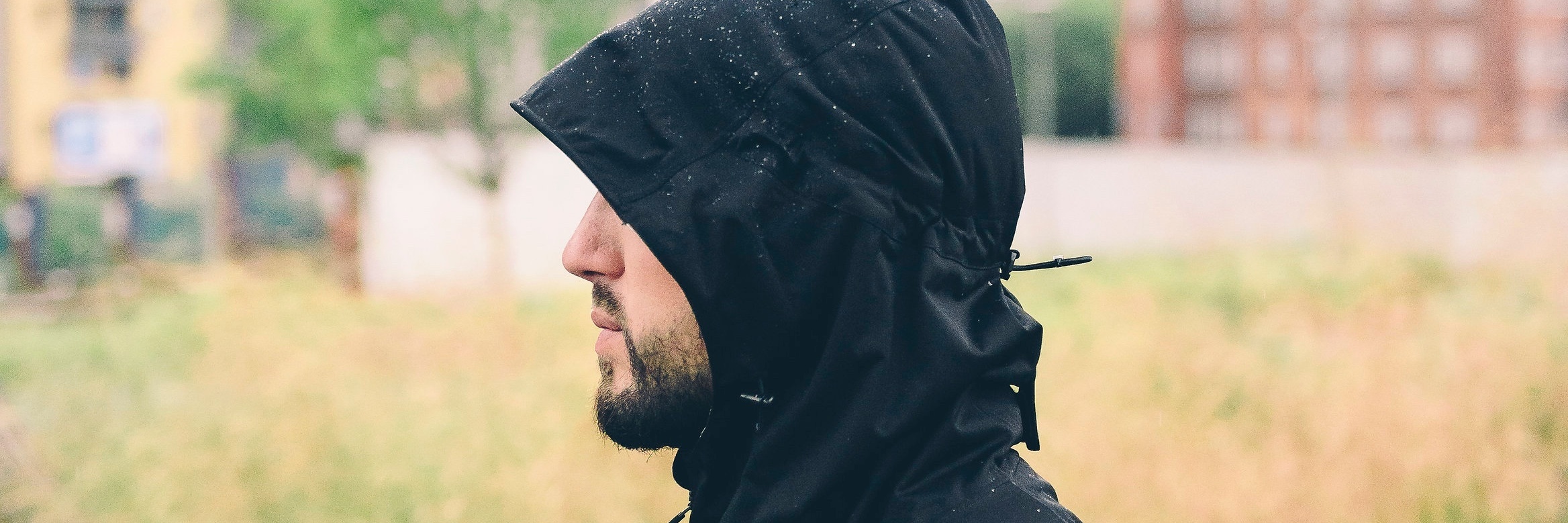 Why You Shouldn't Wait for Things to Get 'Bad' to See a Therapist man looking away