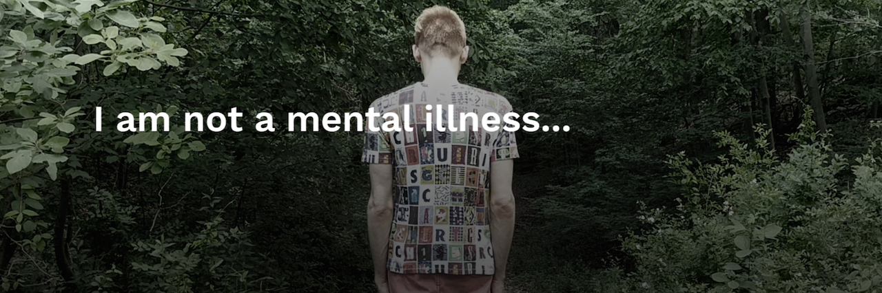 I Am Not a Mental Illness A man walking down a path. Text reads: I am not a mental illness