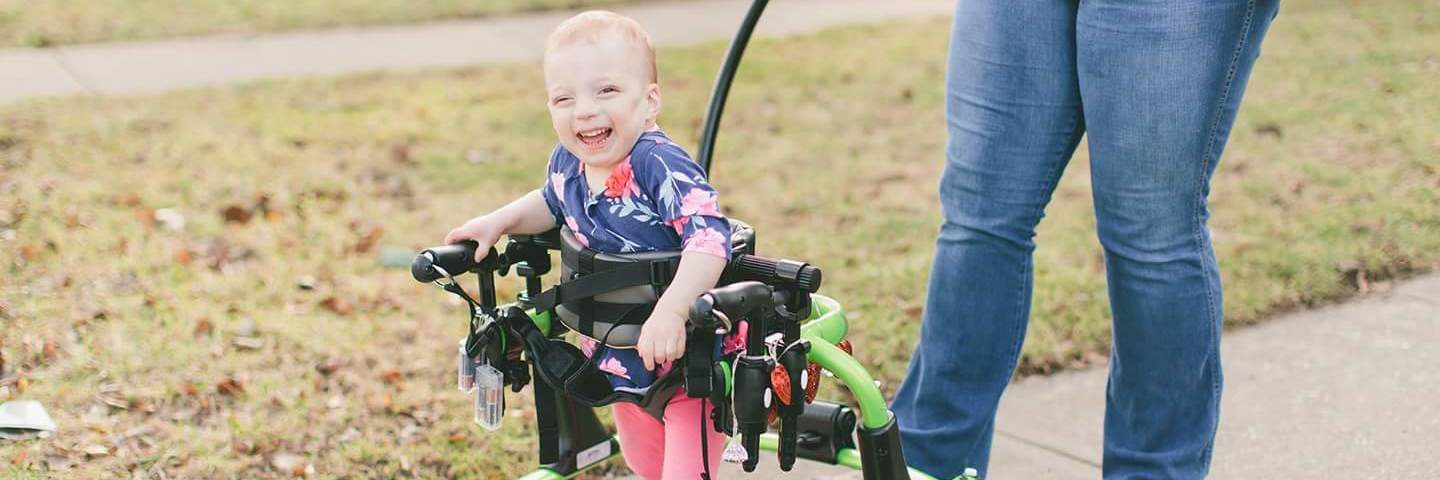 Little girl in her walker