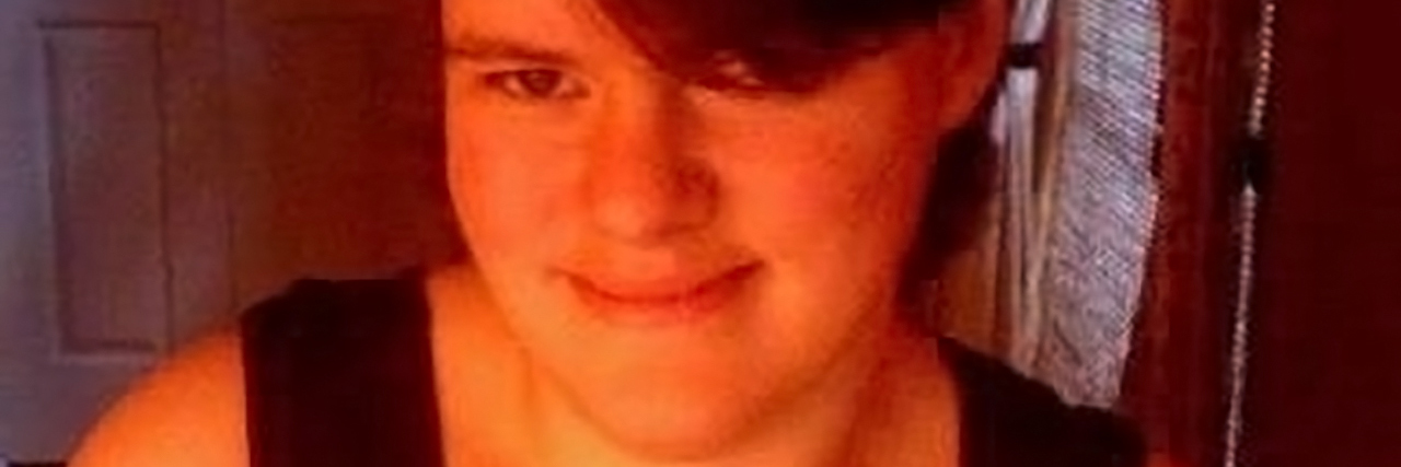 Cerebral Palsy Taught Me to Fight for Myself Jessica wearing a black tank top.