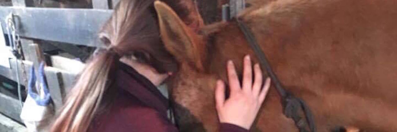 What This Picture Doesn't Tell You About My Depression the contributor and her horse