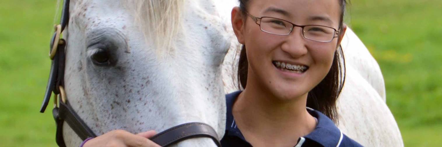 How a Horse Helped Me on My Path Toward Mental Health Recovery The author and her horse, with one arm around the horse