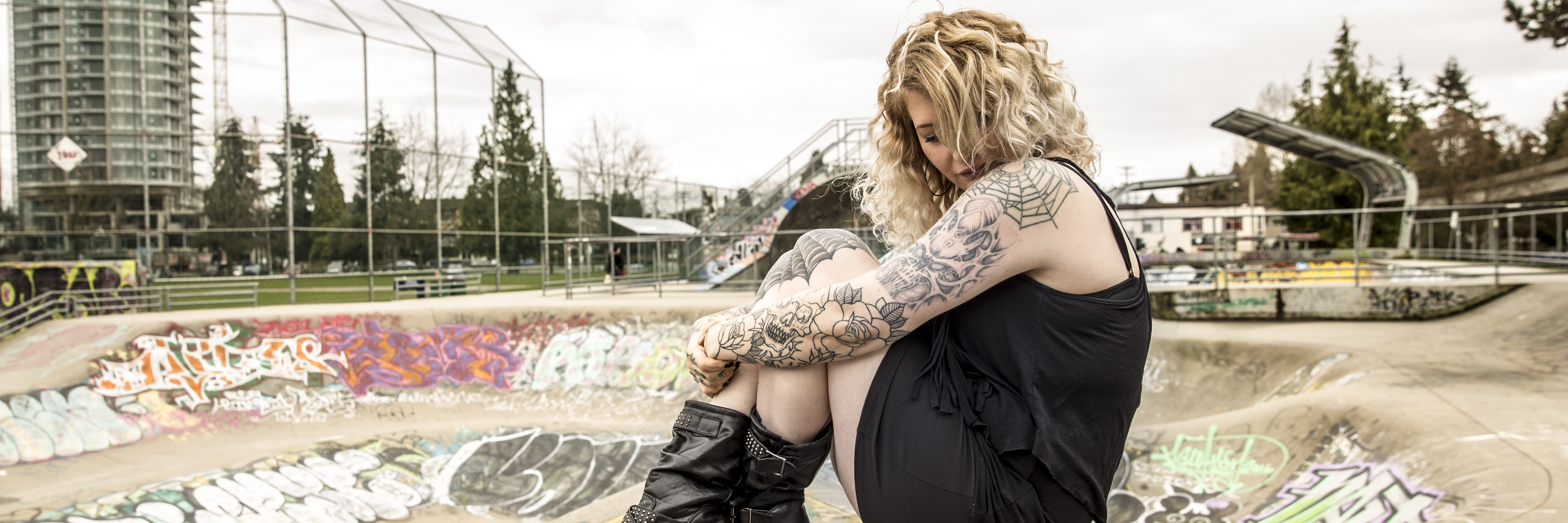 To the Chronically Ill Singles The writer, sitting at a skater's park.