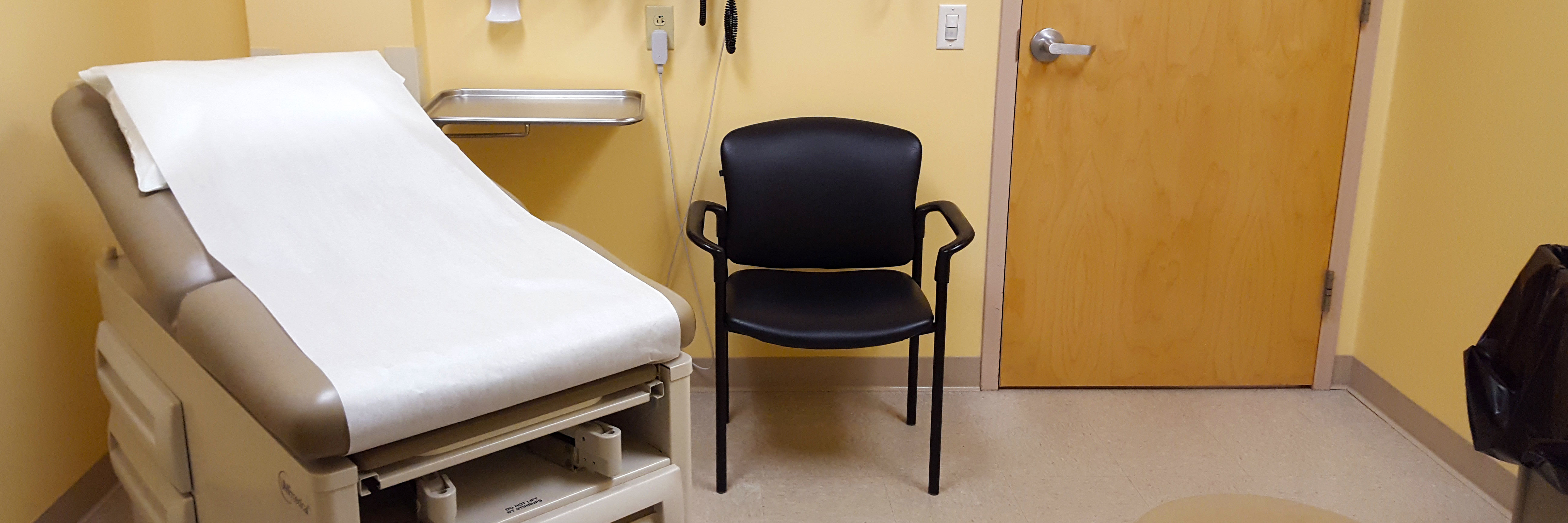 hospital room with chair and bed