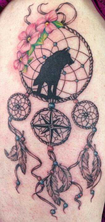 woman's tattoo of a dreamcatcher