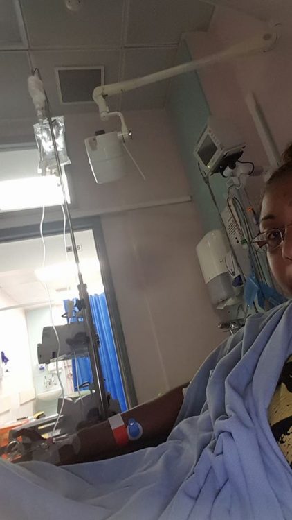 woman taking a selfie in the hospital