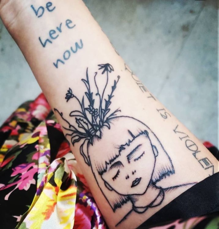 I have depression and anxiety. "Be here now" is a reminder to slow down when I start to spiral and worry. The flower head is to remind me that I'm constantly growing.