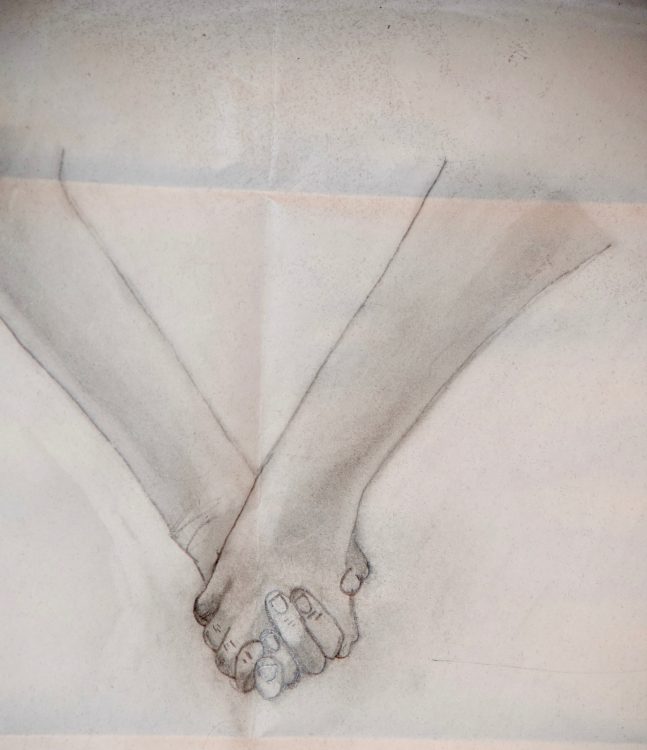 pencil drawing of two people holding hands