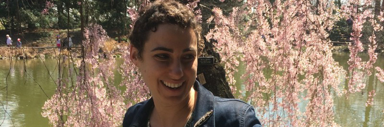 A Hodgkin's Lymphoma Cancer Survivor Turns 30 woman smiling in spring weather