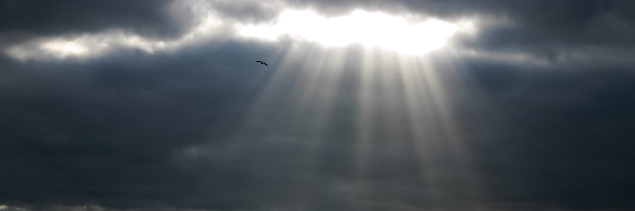 Working Through Insecurities About Disability Light breaking through the dark clouds.