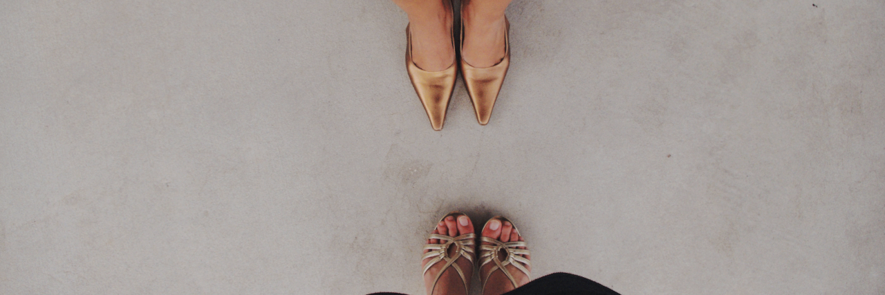 two women's feet facing one another