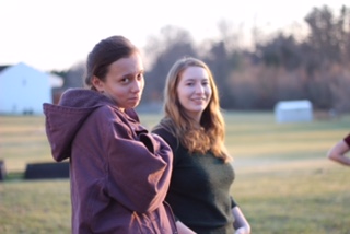 two cousins standing outside