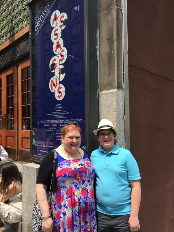 woman and her son in new york city seeing 'assassins'