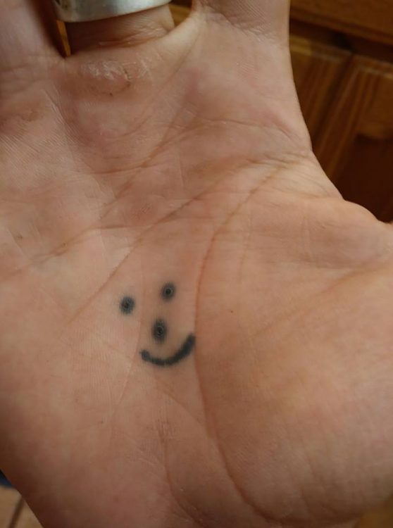 smiley tattoo 