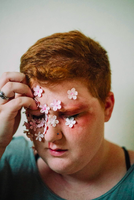 woman flowers on face