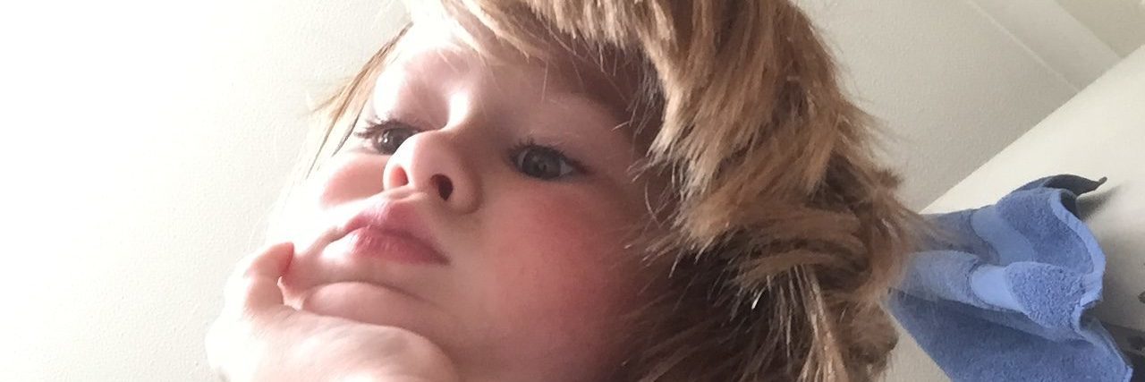 Tips to Help Your Son on the Autism Spectrum Cope With Haircuts Little boy with long hair