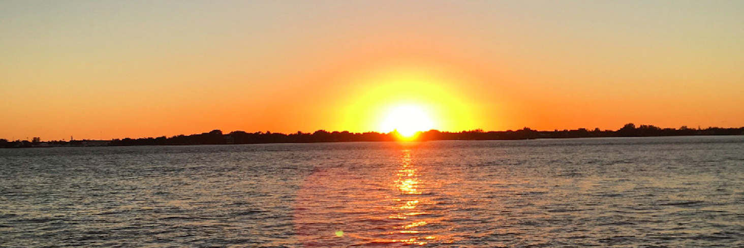 What Grief Looks Like for Me After the Loss of My Father Sunset over water