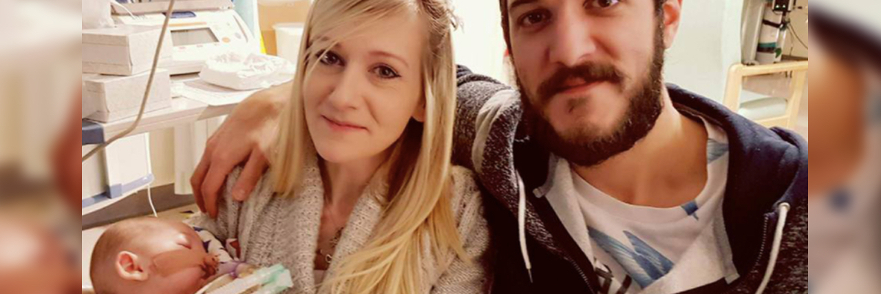 Charlie Gard's Parents End Legal Fight Connie Yates and Chris Gard holding their son Charlie Gard
