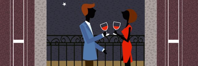 Couple Holding Wine Glass Standing In Balcony