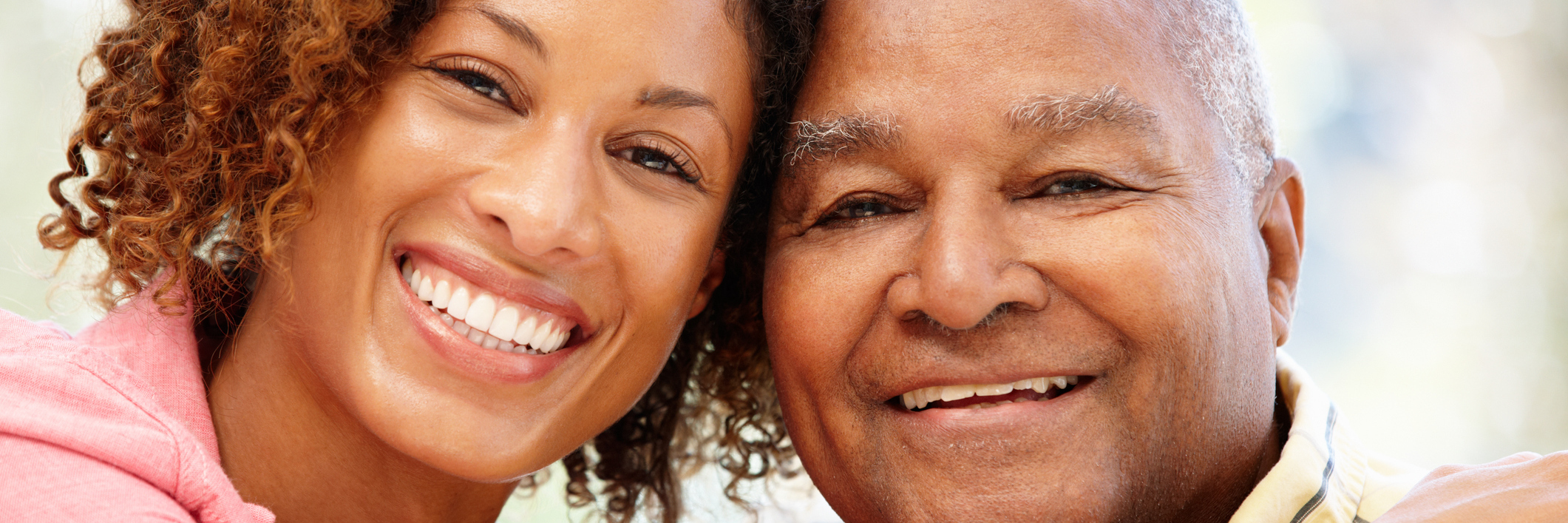 How My Father Encourages Me to Keep Fighting Fibromyalgia woman smiling and hugging her father