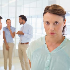 Colleagues bullying co-worker.