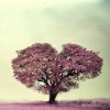 Illustration of pink heart-shaped tree against gray sky background