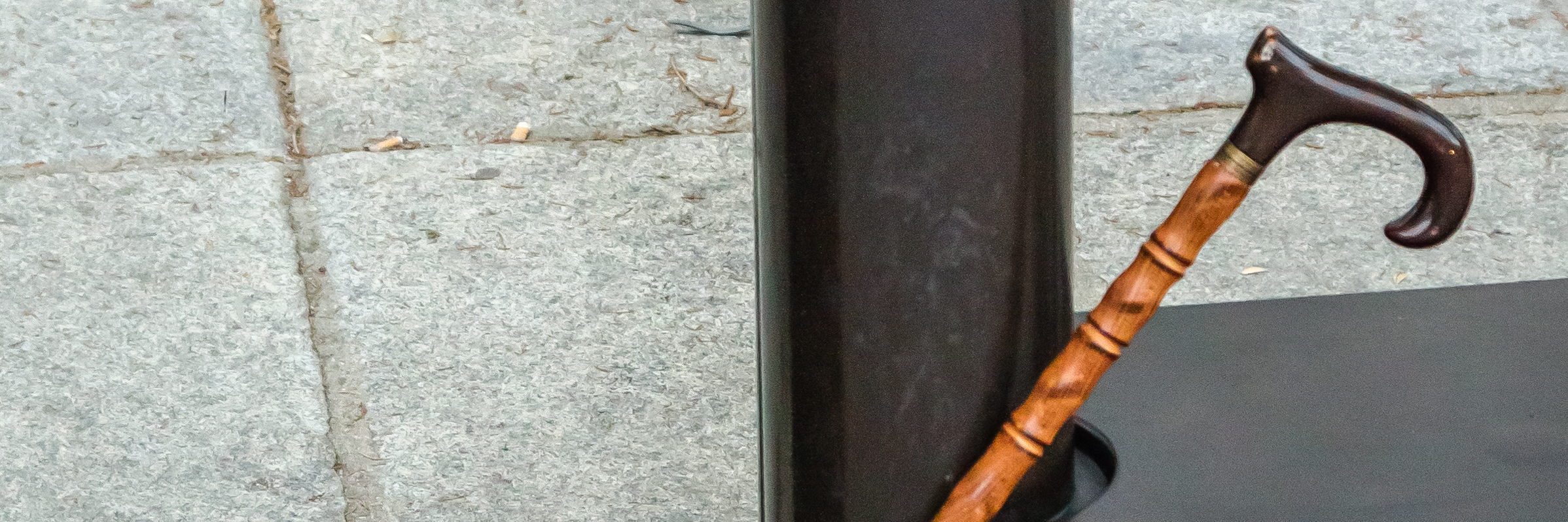 When a Cane Brought Visibility to My Invisible Illness A can resting on a bench.