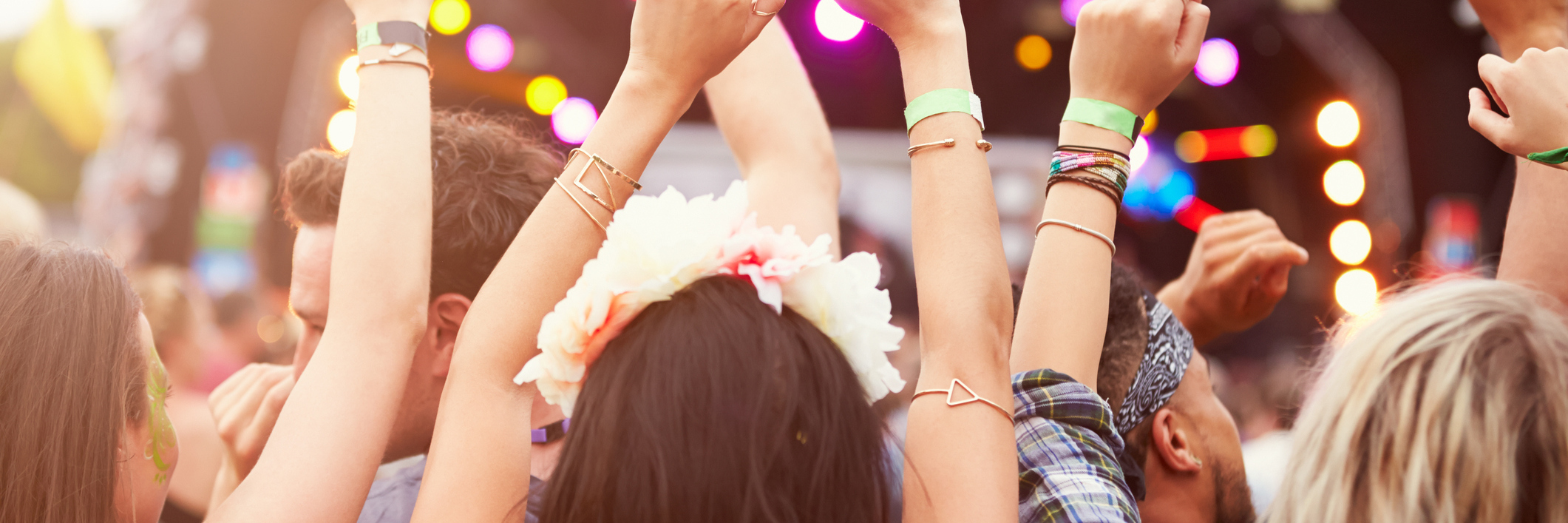 Getting a Pain Flare of Fibromyalgia After Going to a Concert or Event girls in the audience at a music festival