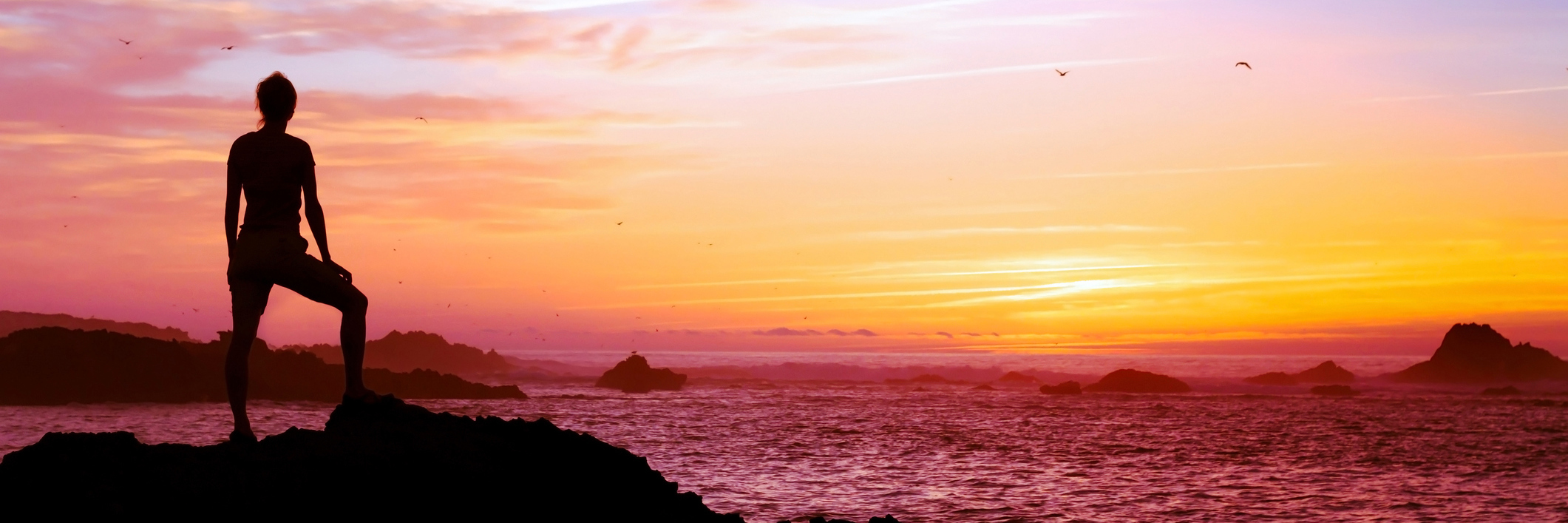 PTSD, and Why I'll Never Be Able to 'Get Over It' woman silhouette watching sunset over ocean