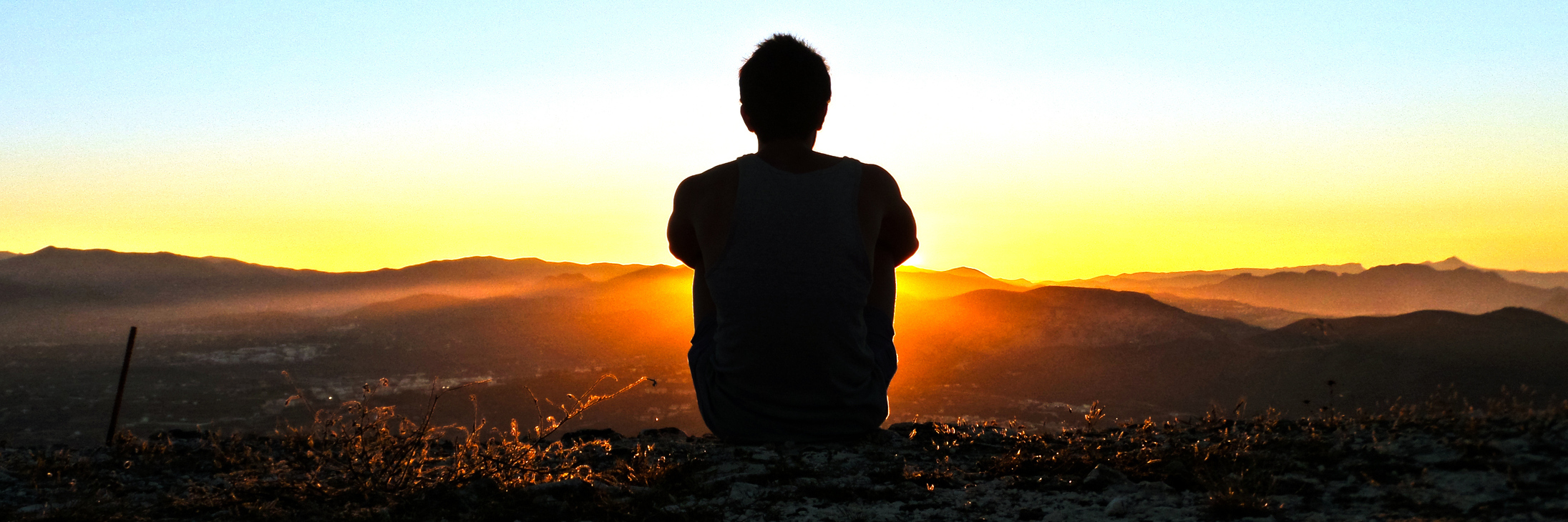 Life Lessons I Learned About Cancer From My Friend, Mr. Hodgkin man reflecting at perfect sunset