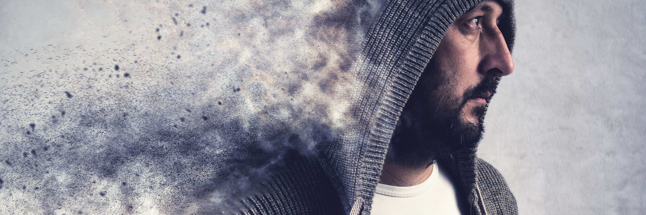 What the Voice of My Obsessive-Compulsive Disorder Sounds Like man with beard dissolving against grey background