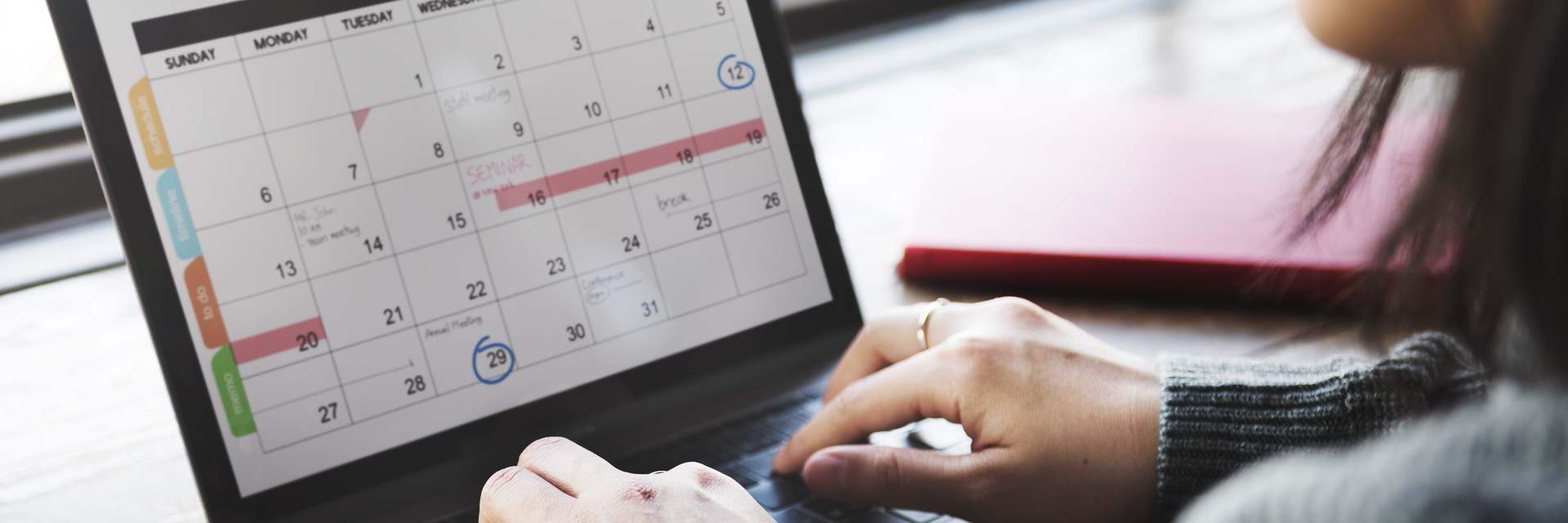 Trying to Plan Ahead When You Have a Chronic Illness woman looking at her calendar on her computer