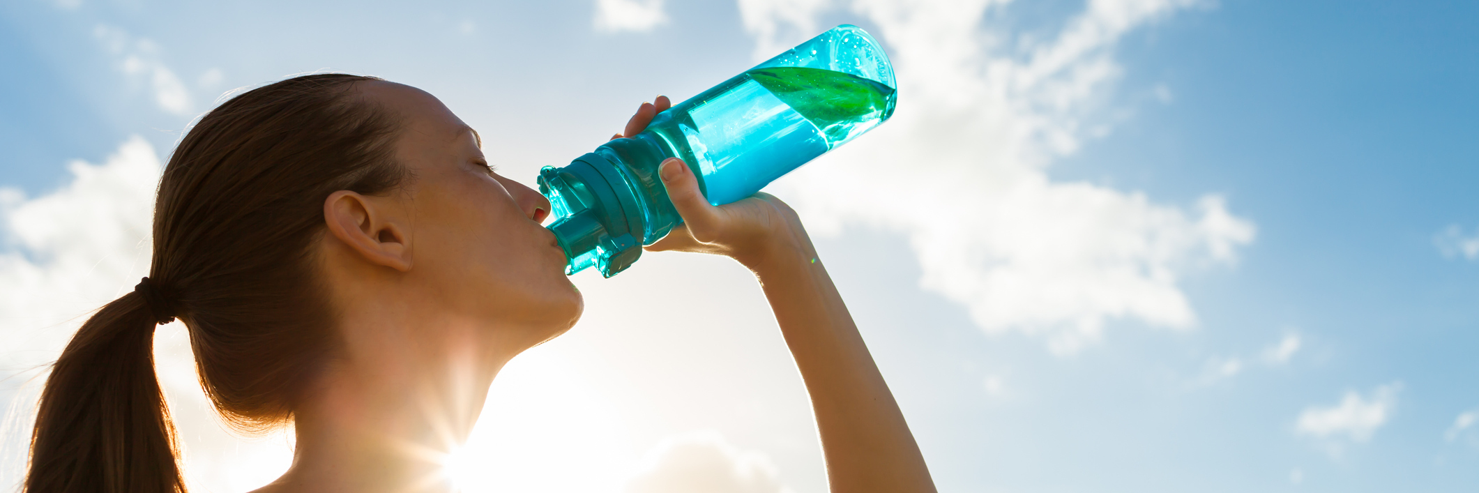 Hydration Tips From Dysautonomia Support Network Members Woman drinking a fresh water from bottle.