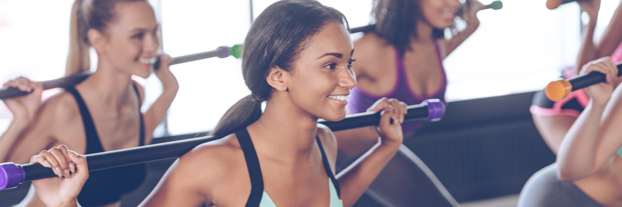 What It's Like to Exercise With Heart Problems Women in an exercise class.