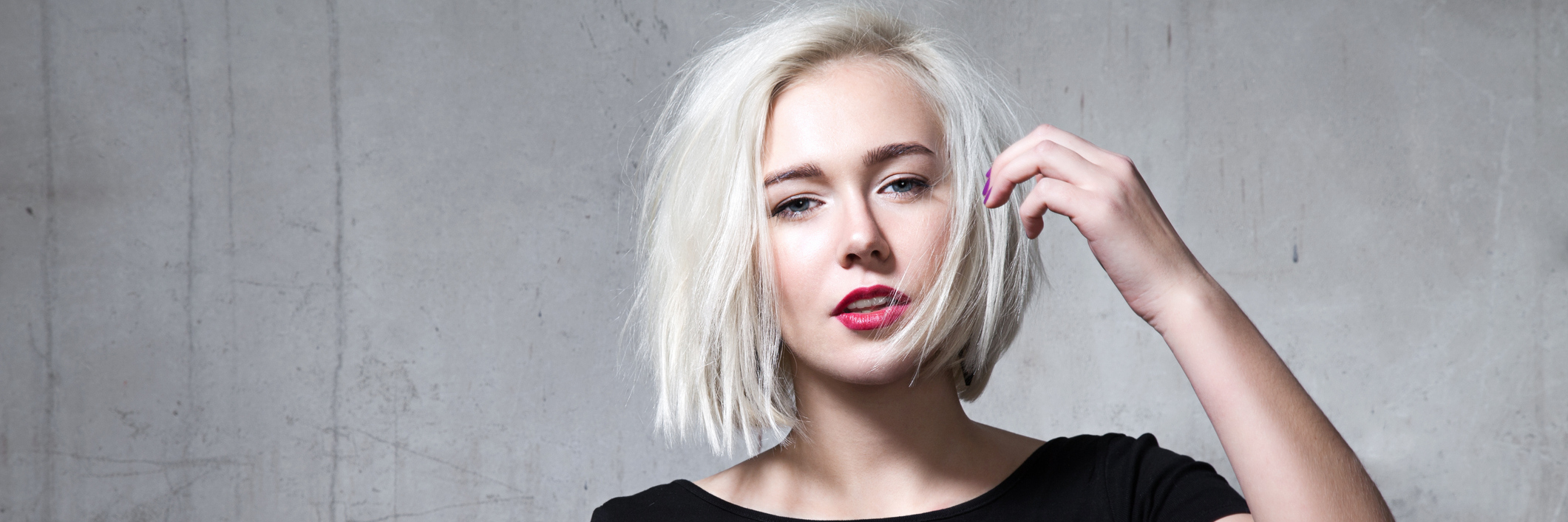 My Collagen Is Faulty – Not Me A young woman looking at the camera.