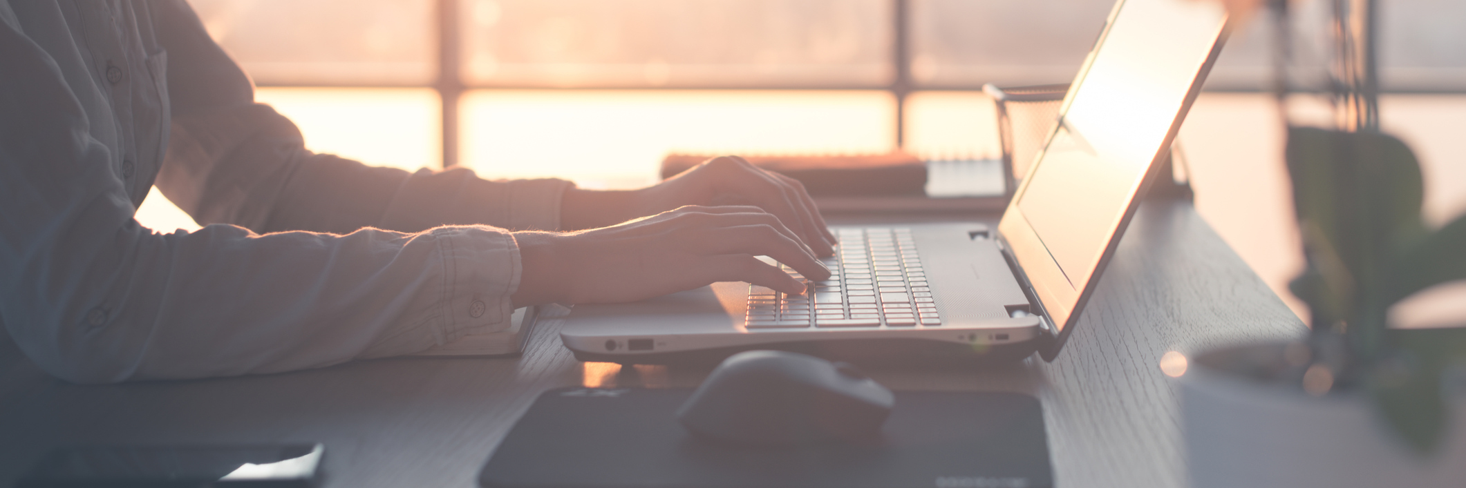 Amazing Response After Speaking up Against Stigma woman working at computer in soft light