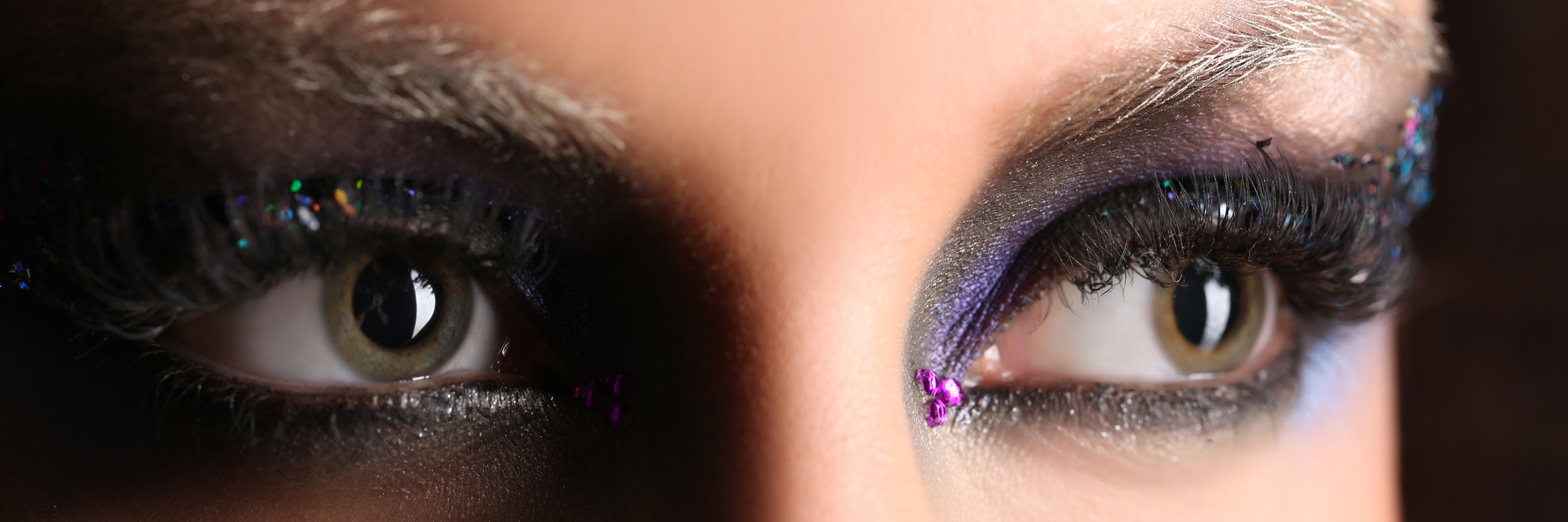 What I've Learned About the Hard Days With Multiple Sclerosis A close-up of a woman's face, focusing on her smoky eyes.