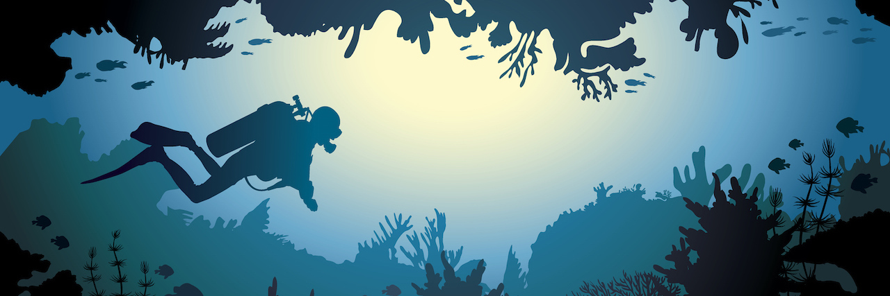 What It’s Like to Have a Panic Attack While Scuba Diving scuba diver underwater