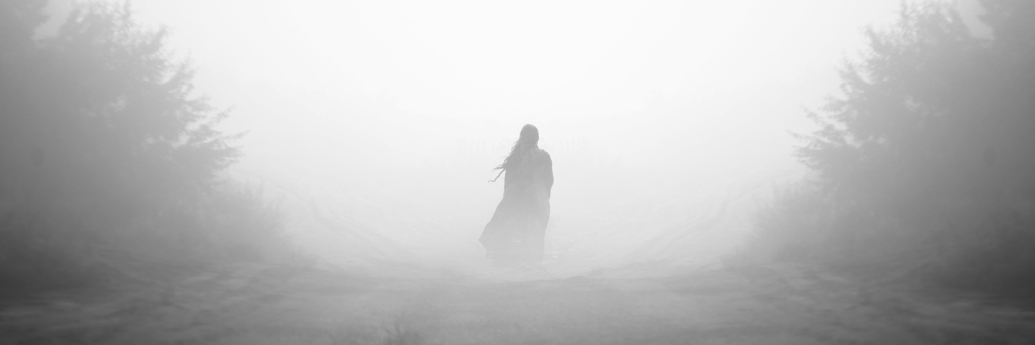 Interstitial Cystitis: Lessons Learned From Brain Fog woman walking down a foggy road in the forest