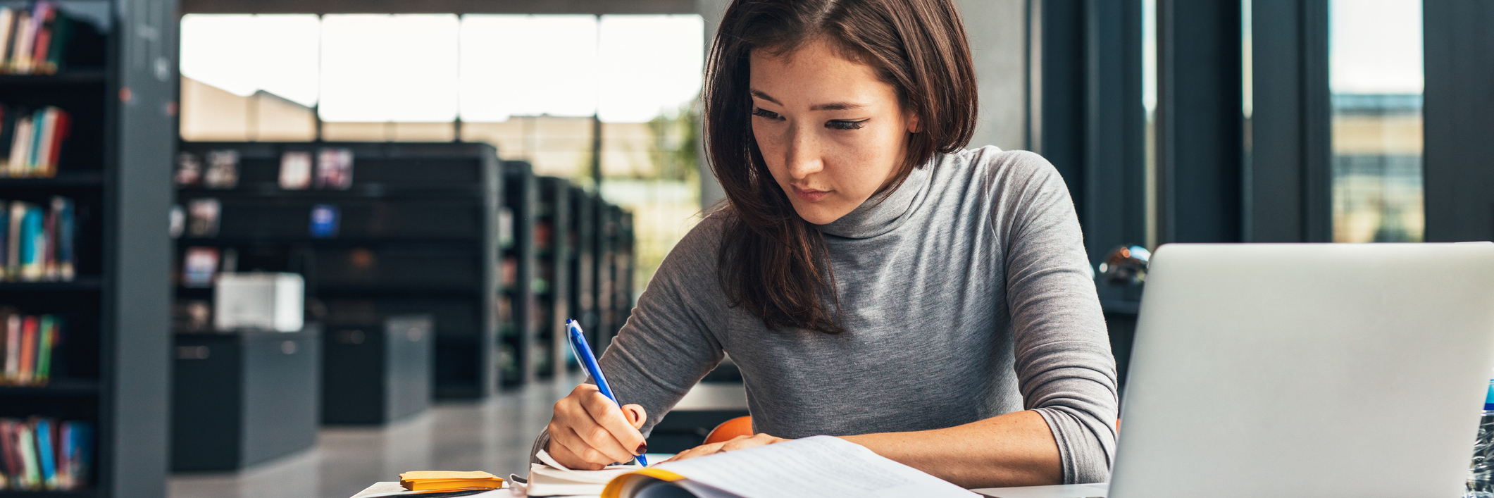 Tips for Being a College Student With Lupus college student studying in the library