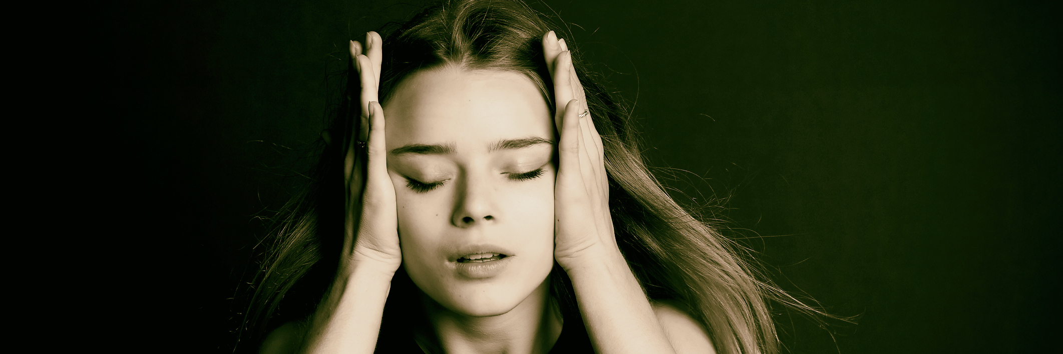 Tips to Make Epilepsy Medication Toxicity a Memory Dizzy woman holding her head.
