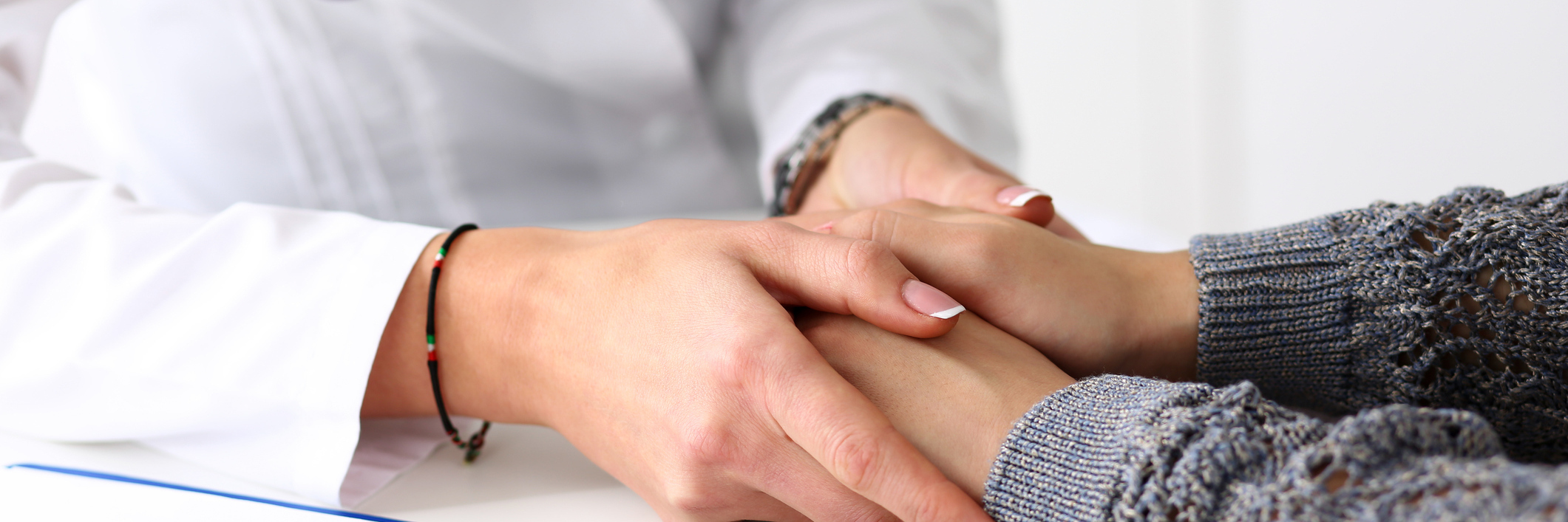 How Getting an Autoimmune Disease Diagnosis Leads to More Diagnoses doctor holding patient's hands