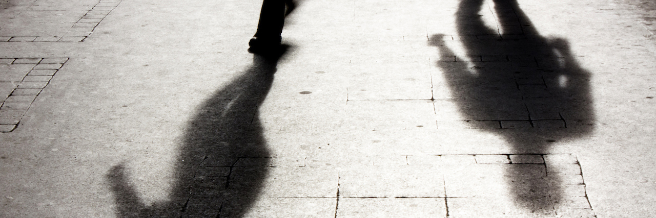 To the Parent Who Has Lost Their Child to Suicide shadows of people walking