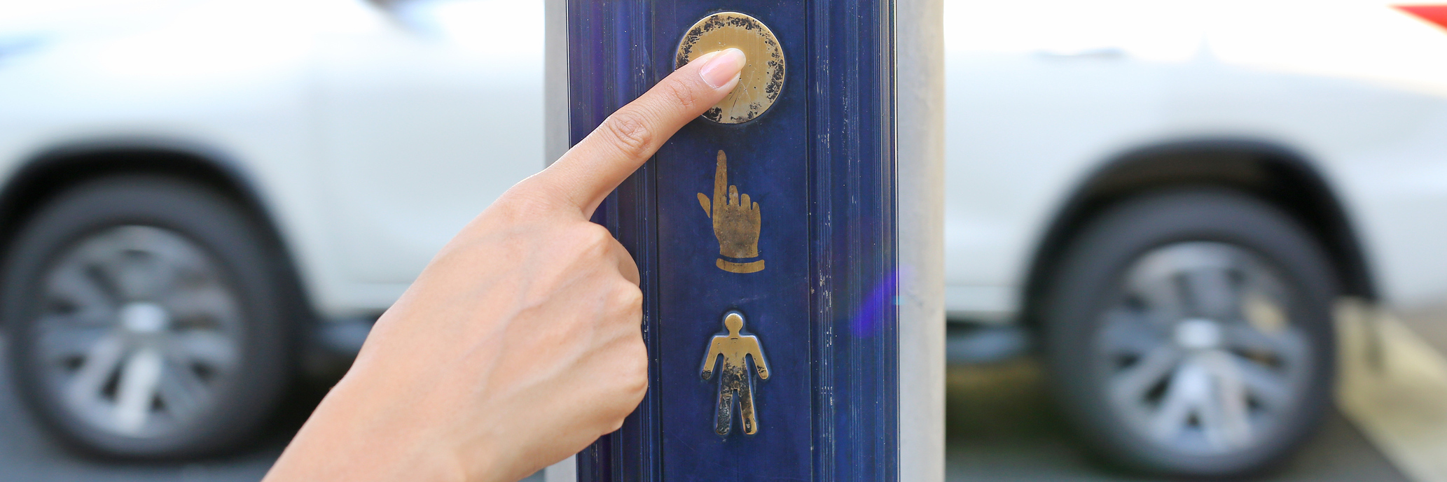 Why You Shouldn't Point out My OCD Rituals woman pushing button to cross road at traffic light