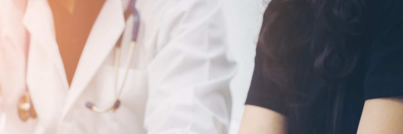 What Being Diagnosed With Cancer Is Like: My Experience Doctor and patient consulting while seated at a table