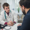 man talking with his doctor