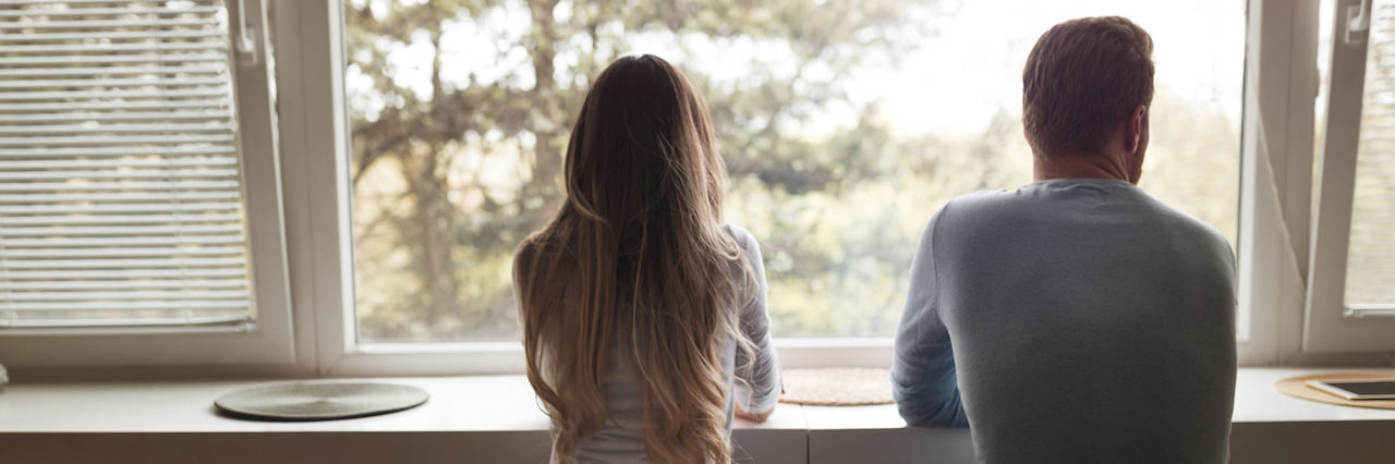 A Letter to the Husband Who Loves Me Through My Depression A couple sitting at a counter