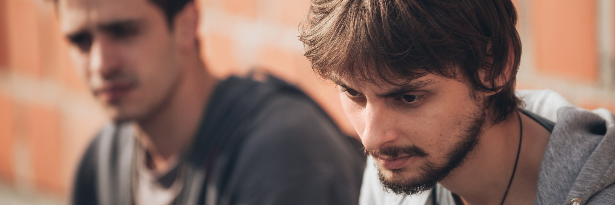 How to Help Someone Get Help for Their Mental Illness two men depression with friend supporting the other