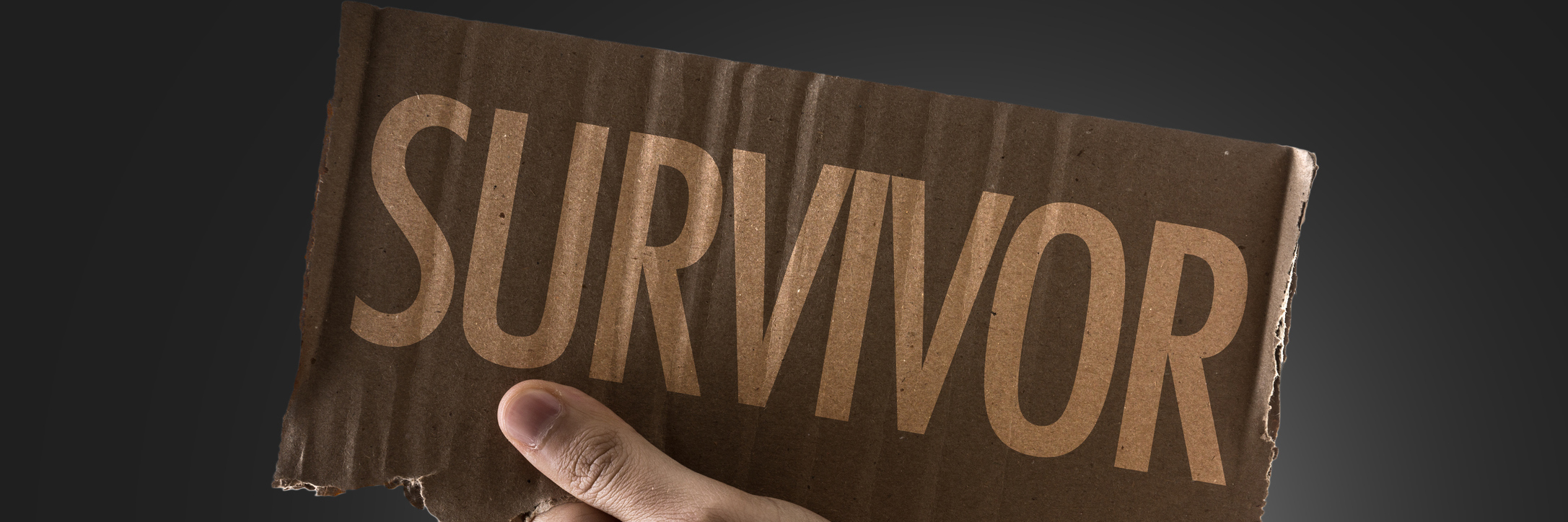 What BRCA Breast Cancer Survivors Really, Really Want After Surgery hand holding survivor sign