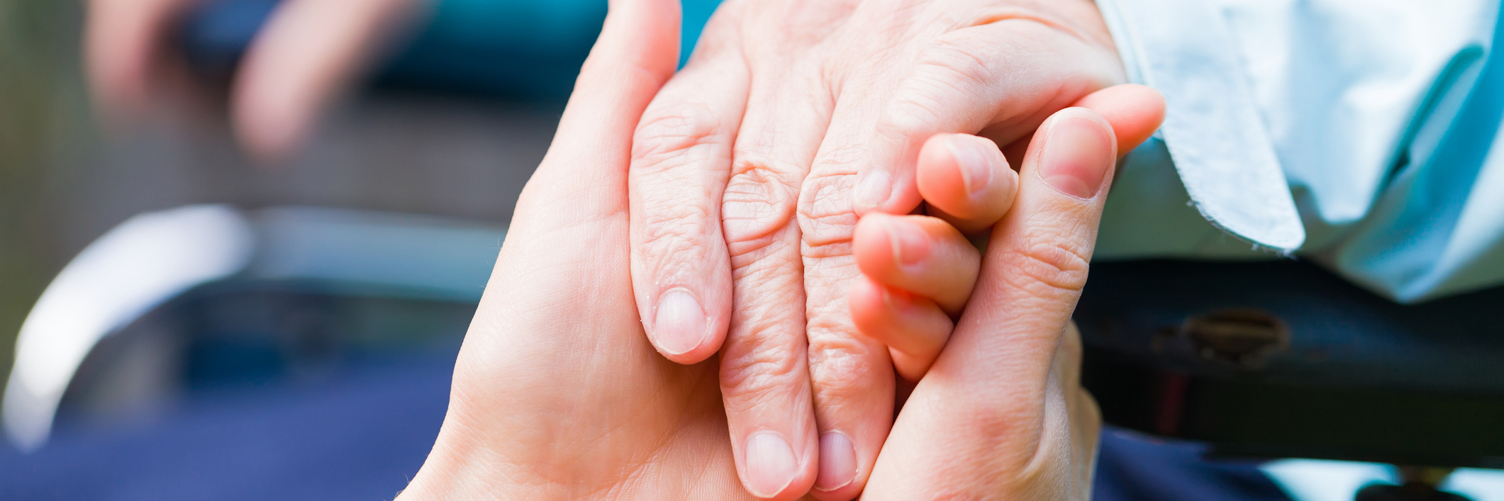 Contemplating Past Suicide Attempts When Faced With Loved One's Death Young carer giving helping hands for the elderly woman